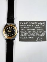 A Lanco vintage gents manual wristwatch with black dial and replacement leather strap