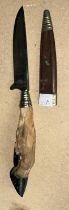 A military style trench knife with deer foot trophy handle, Under Nicker