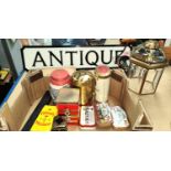 An 'Antiques' metal street sign, a cigar box, a collection of tins and an antique style hanging
