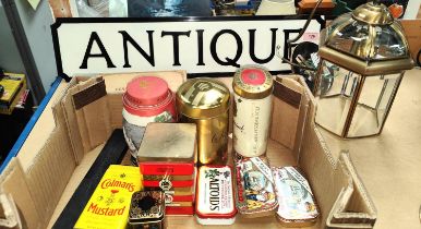 An 'Antiques' metal street sign, a cigar box, a collection of tins and an antique style hanging