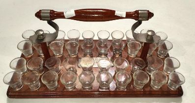 An early 20th century wooden communion glass tray complete with glasses (matched set)