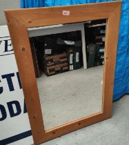 A modern pine rectangular framed wall mirror including frame 94x68cm