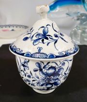 A First Period Worcester soft paste porcelain in blue and white lidded pot with floral decoration,