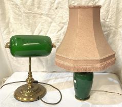 An ormolu mounted green table lamp; an Edwardian style reading lamp with opaque green shade