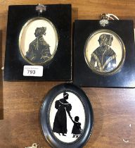 Two 19th century silhouettes of Victorian women with gilt highlights in ebonised frames and gilt