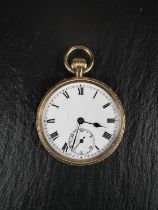 An Edwardian 18 carat hallmarked gold, open faced, keyless fob watch with a white dial and extensive