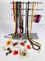 A selection of modern costume jewellery to include bead necklaces, shell necklace, bracelets and