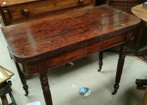 A 19th century rounded rectangular tea table with lobed legs