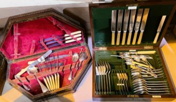 Three incomplete canteens of cutlery in fitted wood boxes