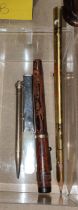 A vintage fountain pen, hall marked silver and mother of pearl letter opener two gilt pencils etc