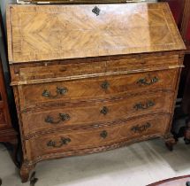 A mid Georgian figured walnut fall front bureau with wide crossbanding and quarter veneer flap