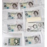Six £5 notes (Elizabeth Fry); a £1 and 10s. note