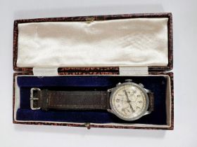 An unusual 1930's Vetla Chronograph wristwatch with chrome case, graphic numerals on later leather