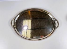 A hallmarked silver gadrooned oval tray, Sheffield 1931, length 43cm, 35oz