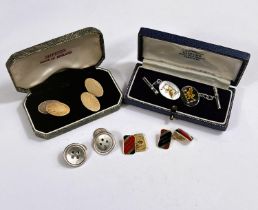 A cased set of silver and enamel cufflinks, dragon crest, other similar cufflinks