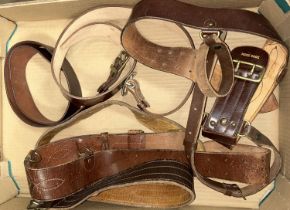 Five military style tan leather belts, one Moss Bros with shoulder cross.