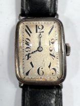 An unusual white metal cased Art Deco gents wristwatch with stretcher Arabic numerals on later strap