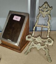 An early 20th century oak combination hallmarked silver photo/picture frame with hinged