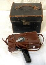 A 19th century plate camera in leather case; a vintage windup cine camera