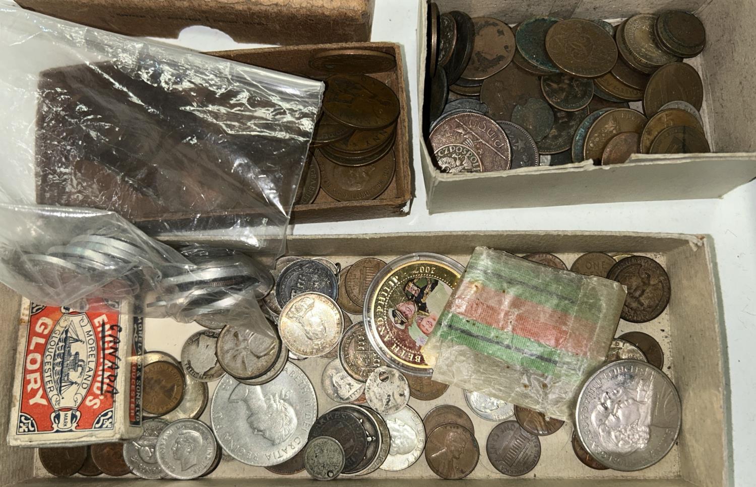 A selection of GB, US and Canadian silver coins; pre-decimal pennies, etc