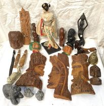 A selection of African/Asian wood carved figures; masks; etc.