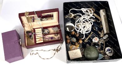 A quantity of costume jewellery with a variety of necklaces, brooches, pill boxes etc with 2 small