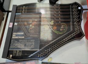 A German Akkordzither with instruction book