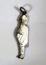 An unusual 19th century rude/humorous pocket watch fob depicting gentleman with pop out genitalia,