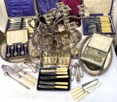 A selection of silver plate:  5-branch candelabrum; serving platters; cutlery; etc.