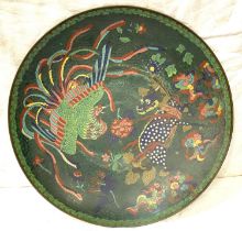 A cloisonné large circular wall plaque depicting fighting cock and dog, diameter 46cm (some enamel