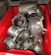 A collection of pewter jugs including tankards etc