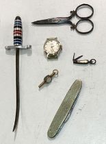 A miniature penknife with two blades (3 cm with blade extended); watch key set with coloured