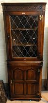 A Titchmarsh & Goodwin period style distressed oak full height corner cupboard with leaded glass