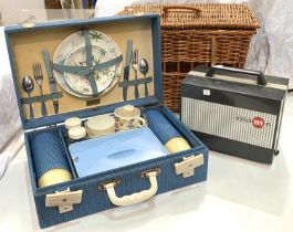 A Brexton fitted picnic box; a picnic basket; a Eumig Mark 8 projector