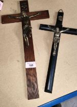 Two wall hanging crucifixes, one ebonised with gilt Christ, the other oak with gilt Christ 32.5cm