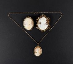 A large cameo brooch in yellow metal mount, a smaller in metal mount and a modern cameo on 9ct
