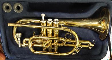 A John Packer trumpet in case gilt body