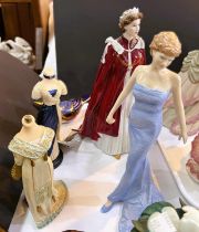 A Royal Doulton figure:  Diana, Princess of Wales; a Royal Worcester figure:  QEII 80th Birthday;