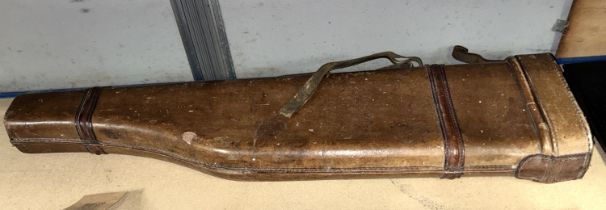 A tan hard leather 'Leg of Mutton' gun carry case