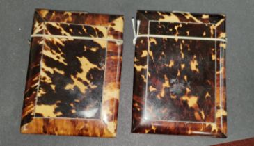 Two Victorian tortoise shell card cases of rectangular forms with hinged lids, with bone trim, 10.