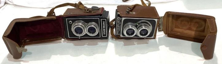 A Ricohflex model VII camera and a Photina Reflex camera.