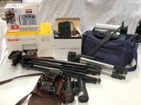 A Samsung camcorder; other cameras; accessories; binoculars; etc.