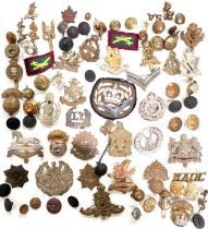 A collection of military badges, 'The Royal Dragoons' etc.