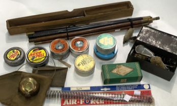 A selection of gun cleaning rods and utensils; air gun pellets; etc.