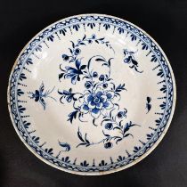 A First Period Worcester soft paste porcelain in blue and white dish with floral decoration,