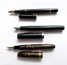 A 1920's rolled gold cased wristwatch and a Waterman's fountain pen, another with a 14ct nib