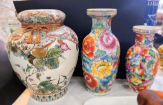 A Japanese Satsuma vase in the form of a bag, lid (a.f.); two other Chinese vases and three