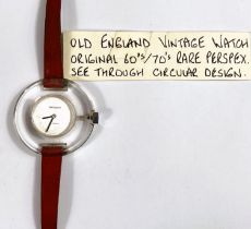 An Old English unusual vintage wristwatch 1960's/70's with circular clear perspex holding cream dial