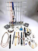 A selection of costume jewellery:  bracelets; necklaces; pendants and watches