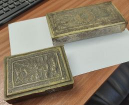 A Persian gilt a and white metal cigarette box, a smaller silver on copper box and a silver just